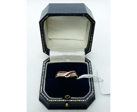 Ladies 9ct Yellow Gold Ring with corssover Ruby &amp; Diamond Channel setting, 3.2g total weight. Size R 