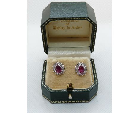 Pair of Good Quality Ladies Diamond &amp; Ruby cluster earrings, 0.50ct Diamond and 1.5ct total Ruby total, 2.5g total weight