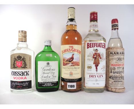 5 Various bottles, 1x Famous Grouse 43% 1 litre, 1x Beefeater Dry gin 47% 1 litre, 1x Gordons London gin 70 proof 13 1/3 floz