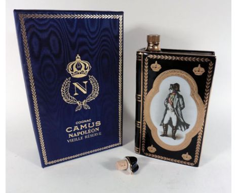 A Camus Napoleon Vieille Reserve Cognac in a limited edition Limoges Castel ceramic book shaped decanter with 22K gold decora