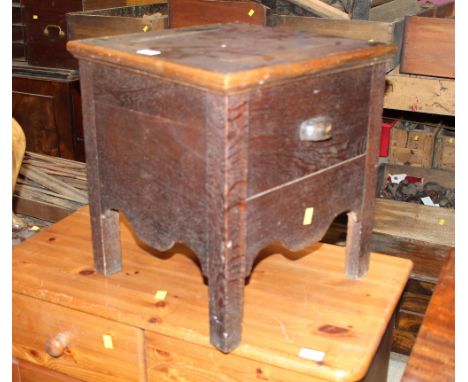 A 19th century oak commode, measuring 45 cm tall