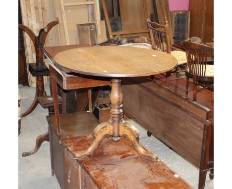 A 19th century oak tile topped tripod table 