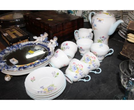 A Shelley Wild Flowers patterned coffee set, comprising coffee pot, 6 tea cups, 5 saucers, sugar bowl and milk jug