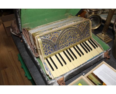 A cased Rialto accordion 