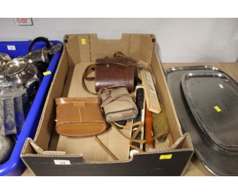 2 pairs of cased binoculars, a Kodak 66 camera, recorder musical instruments, etc.  
