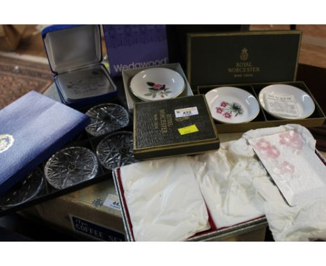 A small collection of miniature plates by Wedgwood and Royal Worcester, coasters, and other items
