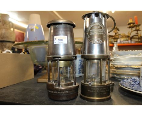 2 miner's lamps, to include an Eccles protector lamp with presentation inscription to its base
