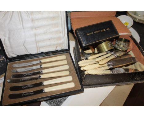 A box of silver plate, to include bone handled knives, sugar tongs and ladle, plus a cased set of 6 Hanover stainless steel t