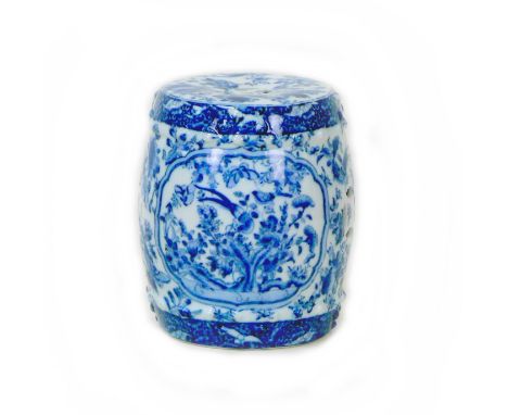 A small Chinese porcelain garden stool, 20th century,  underglaze blue decoration with birds, butterflies and flowers, as wel