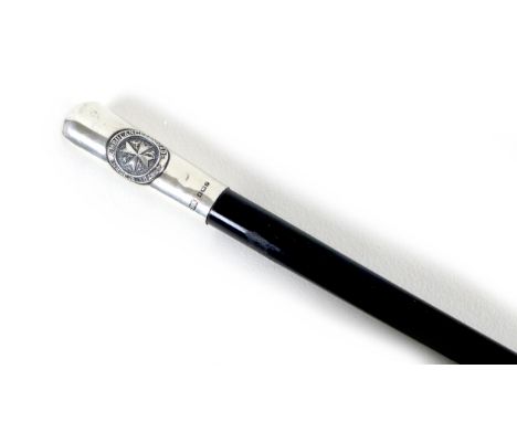 An Edwardian silver mounted swagger stick, ebonised shaft with silver handle and cap, for The St John Ambulance Brigade, make