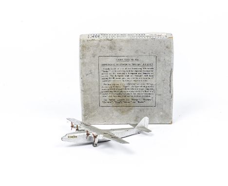 A Dinky Toys Wartime 62p Armstrong Whitworth 'Ensign' Air Liner, silver body, four red three bade props, gliding hole, 'Elsin