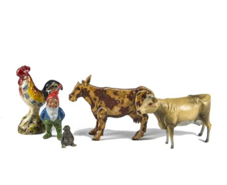 Various animals figures including bronze Penguin chick, hollow lead cow, (probably German),   jointed wooden cow, ceramic Coc