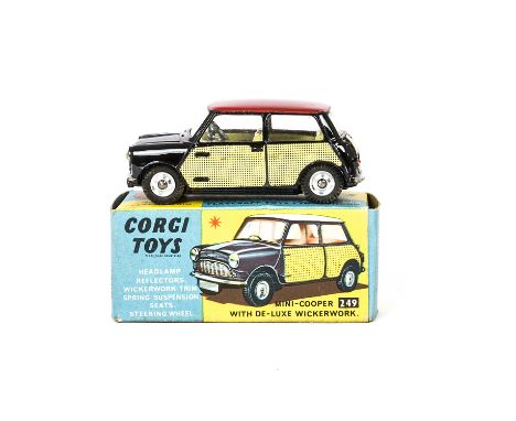 A Corgi Toys 249 Mini Cooper Deluxe, black body, red roof, lemon interior, wicker panels, cast hubs, in original box with clu