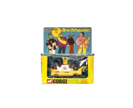 A Corgi Toys 803 The Beatles Yellow Submarine, yellow/white, two red opening hatches with Beatles figures, in original window