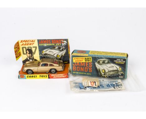 A Corgi Toys 261 James Bond's Aston Martin, gold body, red interior, wire wheels, Bandit figure, in original box with inner s