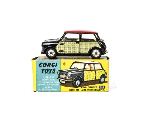 A Corgi Toys 249 Mini Cooper Deluxe, black body, red roof, lemon interior, wicker panels, cast hubs, in original box with clu