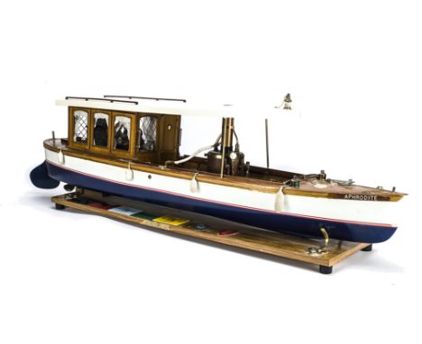 A well made kit-built Steam Launch 'Aphrodite', blue/white hull with varnished decking and white cabin roof, vertical steam b