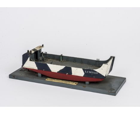 A Bassett-Lowke scale ¼-1' wooden model of a Landing Craft Mechanised Mark 1, finished in grey and red with hazard strips, nu