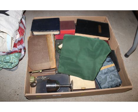 A box of miscellaneous Religious artifacts; a silver spoon with knight terminal; poetry book and other ephemera 