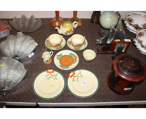 A Clarice Cliff "Crocus" pattern breakfast set; and a pair of Clarice Cliff "Ravel" pattern plates 