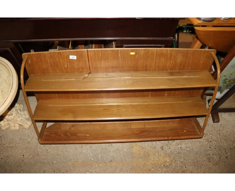 An Ercol style wall shelf 
