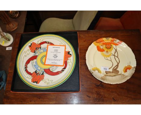 A Wedgwood Clarice Cliff "Solitude" charger and a A.J. Wilkinson Ltd. "Rhodanthe" pattern plate