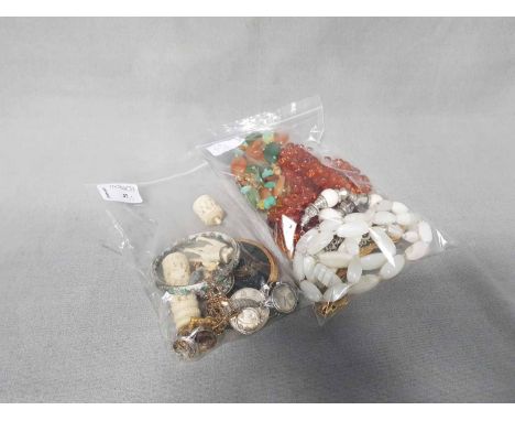 LOT OF COSTUME JEWELLERYincluding Chinese enamel bangle, brooches, and two Chinese coins, etc.