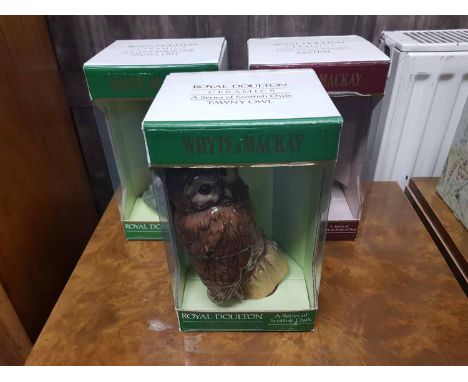 LOT OF ROYAL DOULTON CERAMIC WHISKY DECANTERSsome boxed (11)