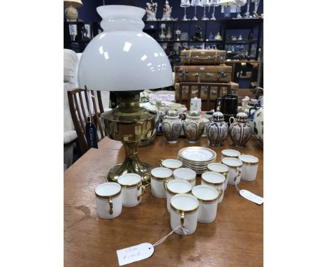 BRASS OIL LAMP WITH OPAQUE GLASS SHADE also a group of Aynsley and Royal Worcester coffee china