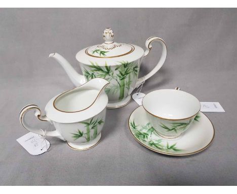 NORITAKE TEA SERVICEconsisting six cups, saucers, and side plates, one teapot, sugar bowl, and creamer