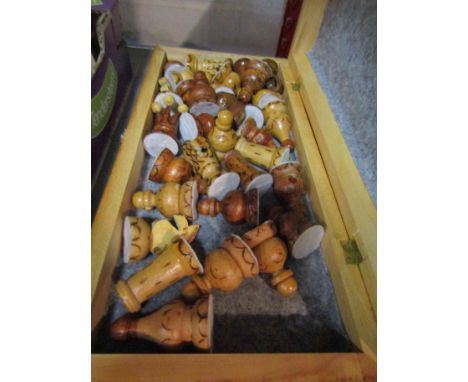 A wooden carved chess set