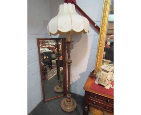 A gilded standard lamp with shade      