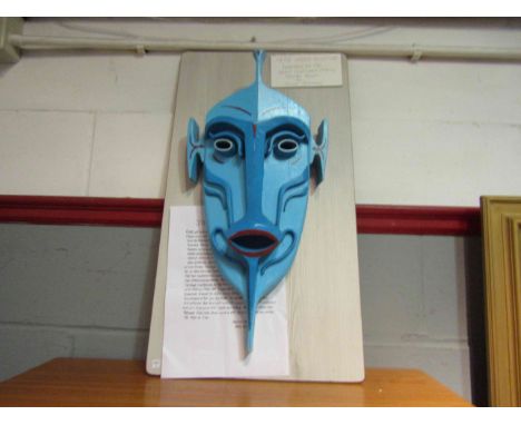 JOHN BEAVEN (XX): A painted wooden sculptural mask inspired by African masks, mounted onto panel.  Mask measures  55cm x  25c
