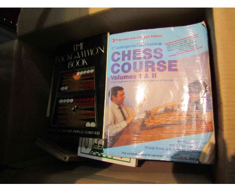 A box of chess and bridge related books