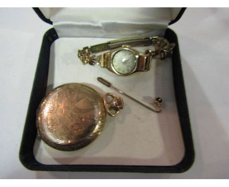 A 9ct gold cased wristwatch, gold plated abd a stick pin (3)