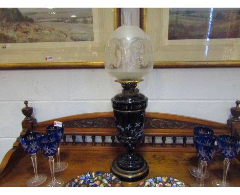 A Bristol blue glass oil lamp with bird decoration 
