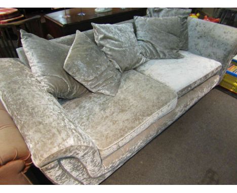 A silver faux suede two seater sofa