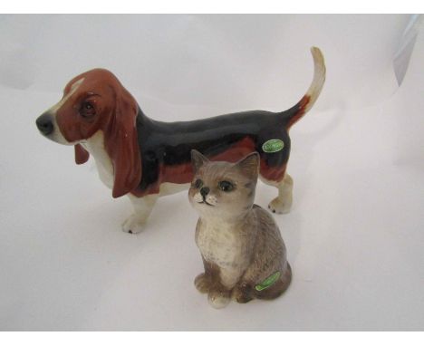 A Beswick Basset Hound "Fochno Trinket", model no. 2045A, together with a Beswick Persian Kitten in grey gloss, model no. 188