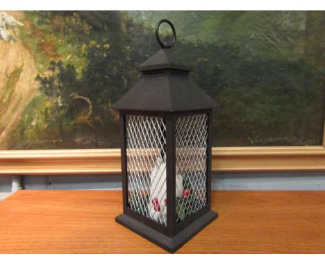 A Christmas light-up lantern