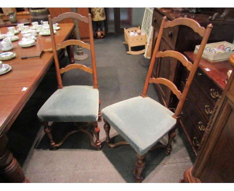 A 19th Century set of six French fruitwood ladder-back dining chairs on turned legs joined by an "X" flat stretcher with cent