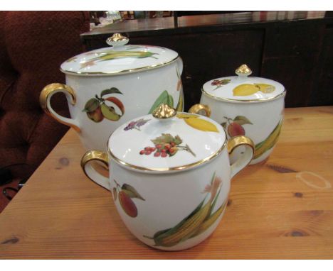 Three Royal Worcester 'Evesham' lidded pots of graduated size