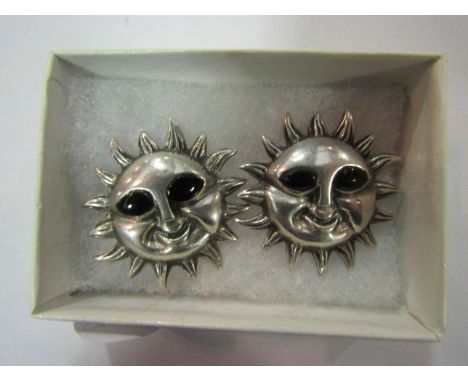 A pair of Mexican silver sun stud earrings with enamel eyes, marked 925