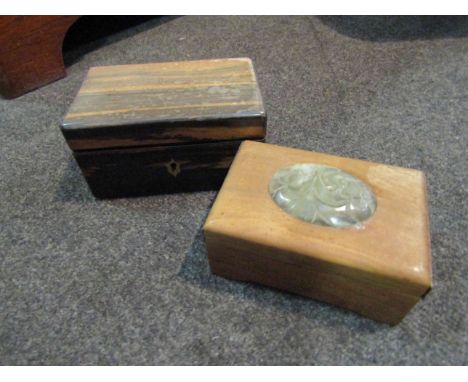 A coromandel trinket box and another with a jade type insert to lid (2)