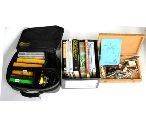 A Collection of Mixed Sporting Memorabilia, including a tackle bag containing spinning reels and boxes of lures, eight books 