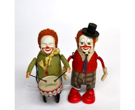 Schuco (Germany) Two C/w Clowns one playing drum (G) another with plastic shoes and hat (G, but lacks bow tie) (2)