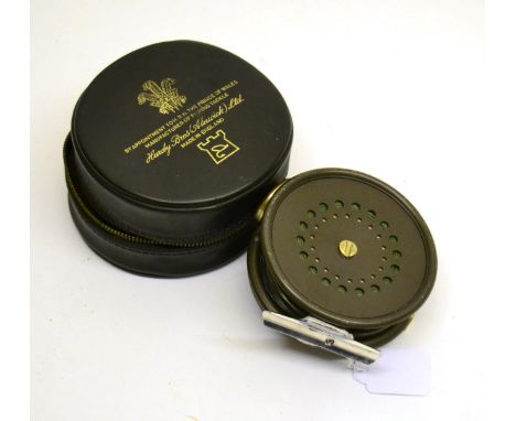 A Hardy 3 5/8inch Alloy 'Perfect' Fly Reel, with black handle, alloy foot, lineguard, grey enamel finish, in a zip case