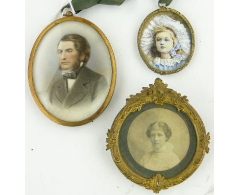 Miniature watercolour on ivory, portrait of a gentleman, unsigned, 3" x 2.25", a photograph in ornate circular ormolu frame a