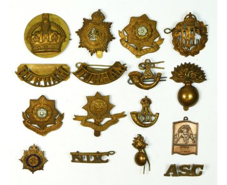 A collection of cap badges, to include RFC, East Yorkshire and Durham Light Infantry. 