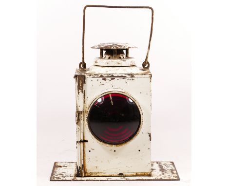 A B.R. (E) Adlake non-sweating lamp, on a metal base, from a ground signal, no burner