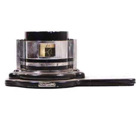 A chrome mounted desk ‘Unigraph’ barometer and thermometer weather station, lacking top section 